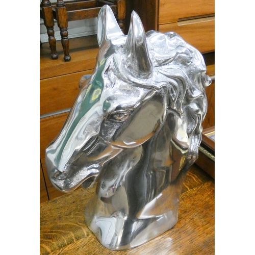 11 - A large polished aluminium horse head ornament