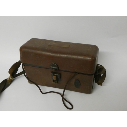 117 - A field telephone in leather case