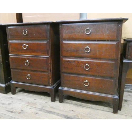 107 - A pair of Stag Minstrel four drawer bedside chests