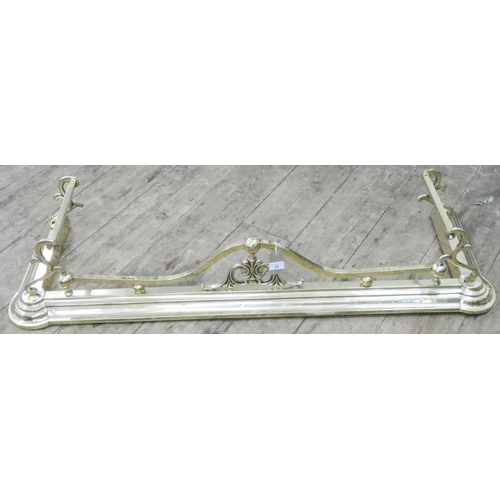 19 - A Victorian style brass fender