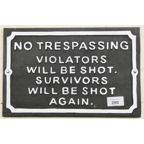 290 - A square cast iron wall hanging 'No Trespassers' sign