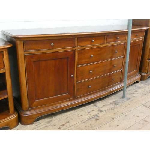 32 - Matching bow front sideboard to previous lot, fitted seven drawers and cupboards, 6'6 wide