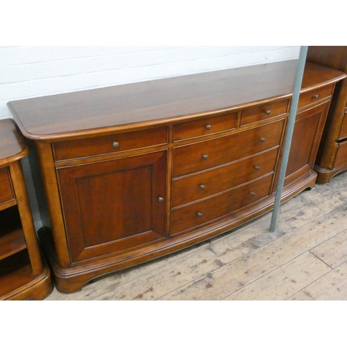 32 - Matching bow front sideboard to previous lot, fitted seven drawers and cupboards, 6'6 wide