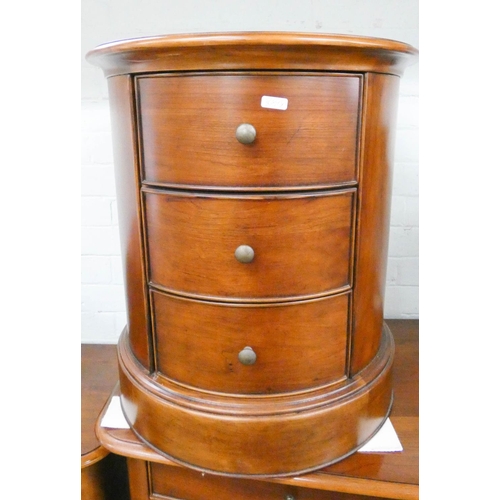 36 - A low circular mahogany chest fitted three drawers matching the previous lots, 21