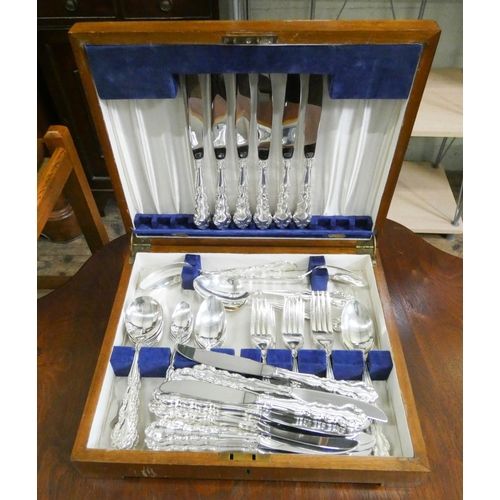 46 - A set of matching plated cutlery in odd case