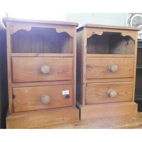 66 - A pair of pine two drawer bedside chests