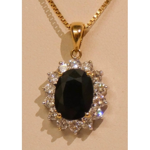 646 - Large modern 18ct gold sapphire and diamond oval cluster pendant on 18ct gold chain. With purchase r... 