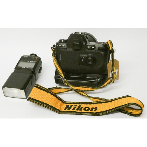 170 - A Nikon F100 camera with large Nikon lens AF Zoom Nikkor and Nikon speed light SP28 in good padded c... 