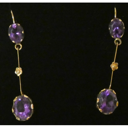 625 - A pair of vintage 9ct rose gold and amethyst drop earrings