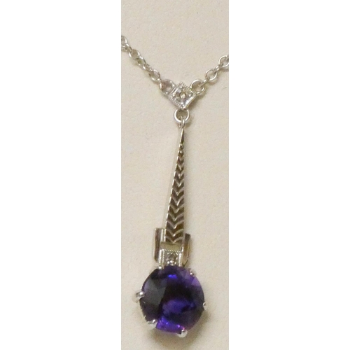 627 - Art Deco style amethyst and diamond white gold pendant, marked 9ct, on unmarked white metal chain