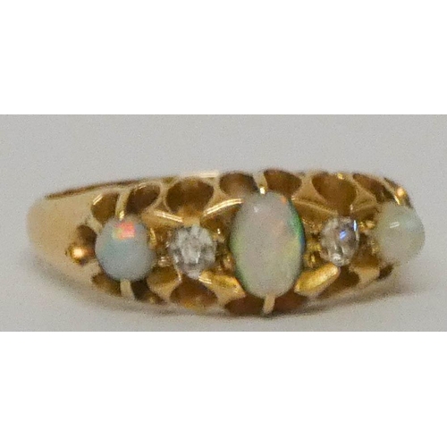 630 - Victorian 18ct gold opal and diamond half hoop ring. Size O