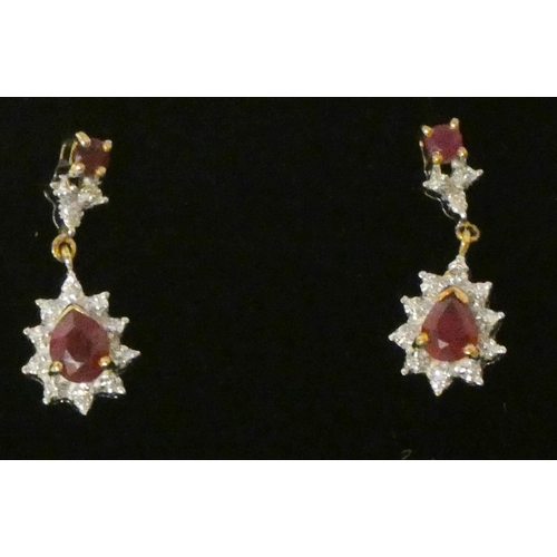 644 - 9ct gold ruby and diamond cluster drop earrings.