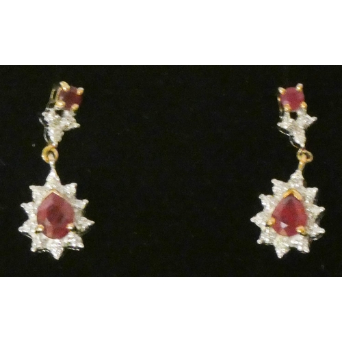 644 - 9ct gold ruby and diamond cluster drop earrings.