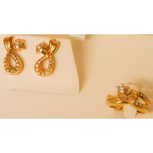 657 - Gubelin - a pair of modern 18ct yellow gold and diamond set earrings together with a matching ring, ... 