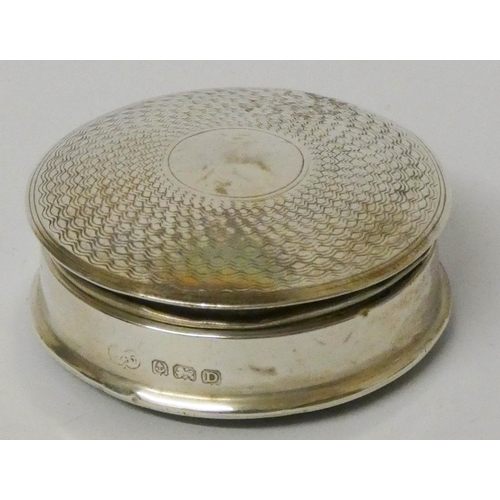 529 - A small circular silver pill box Birmingham 1928