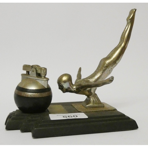 560 - An Art Deco diver figure table lighter