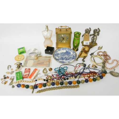 566 - Various small figure ornaments, mantle clock, odd pieces of jewellery, bank note etc