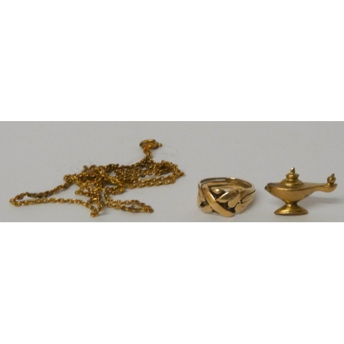 594 - 9ct gold Aladdin's lamp charm, yellow metal ring and a chain.