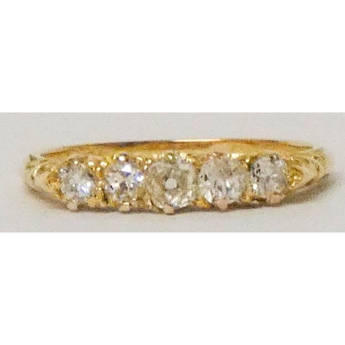 595 - Victorian 18ct gold five stone diamond ring on carved setting, ring size R