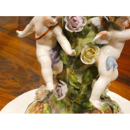 544 - A large Meissen style cherub and floral decorated table centre comport - as found, 16