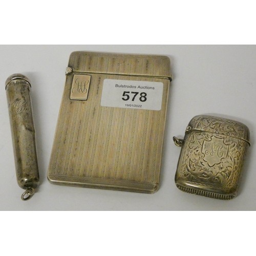 578 - Silver card case, silver Vesta case and a silver cigarette holder case, overall weight 110 gms