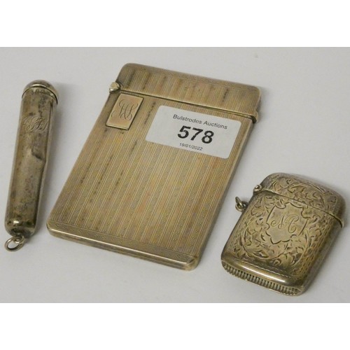 578 - Silver card case, silver Vesta case and a silver cigarette holder case, overall weight 110 gms