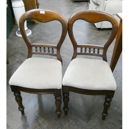 105 - Four Victorian mahogany balloon backed dining room chairs with upholstered seats