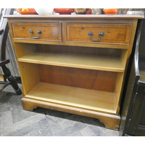 110 - A small reproduction yew wood open bookcase fitted two drawers, 2'6 wide