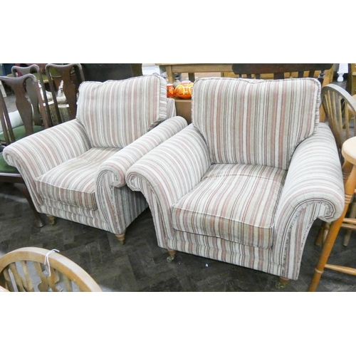 118 - A pair of modern Parker Knoll fawn and striped upholstered easy chairs with loose cushions