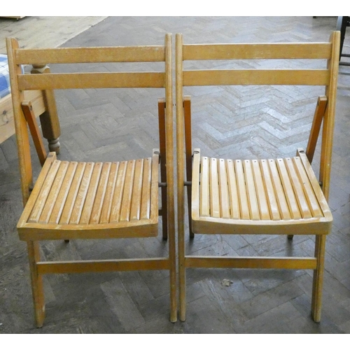 171 - Eight folding meeting house chairs