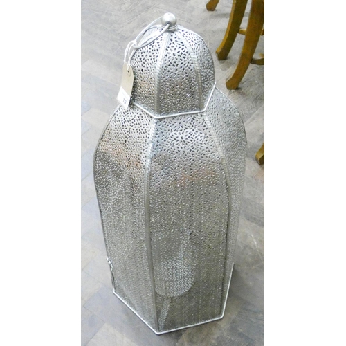 19 - A pierced silver metal hanging Moroccan style lantern