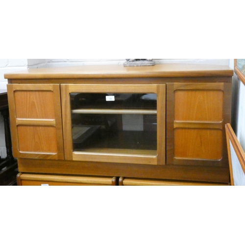 45 - A teak TV and HiFi cabinet with glass centre door