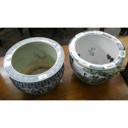 37 - A Chinese blue and white fish bowl and a similar green and white bowl