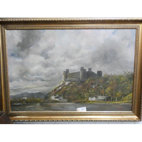 98 - A modern gilt framed oil painting of Harlech castle, by John Corvin