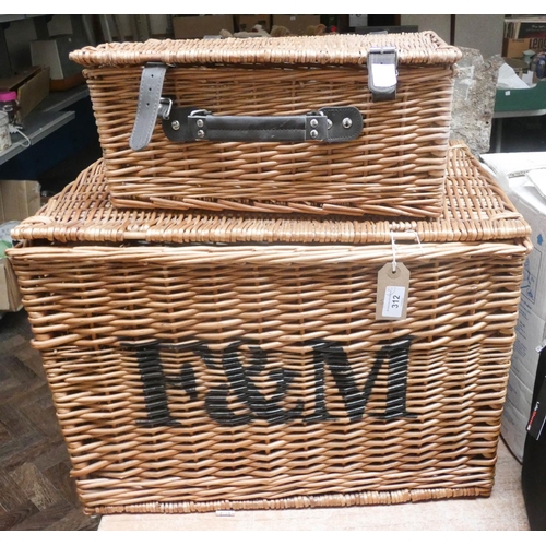 312 - A F&M wicker basket and a one small wicker basket