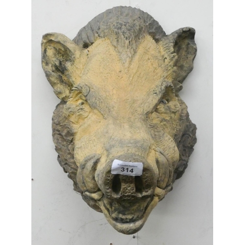 314 - A heavy reconstituted stone wall hanging boars head