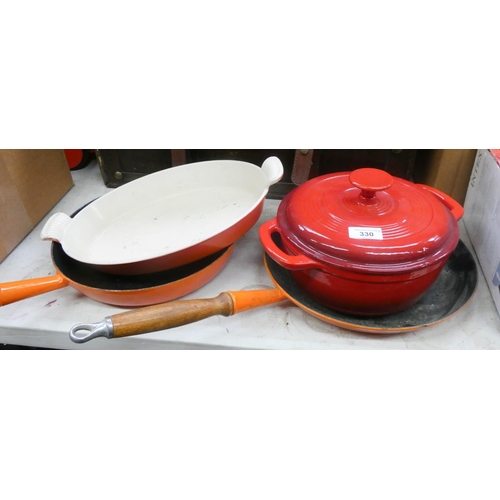 330 - Two large Le Creuset saucepans, Le Creuset dish and one other Le Creuset style dish with lid