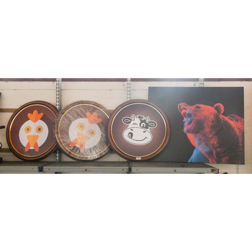 410 - Three circular wood framed pictures, possibly for a children's room, two of chickens and one of a co... 