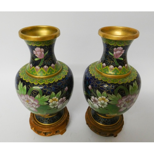 517 - A pair of Chinese blue ground cloisonné vases on stands, measuring 18cms including stand