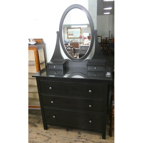 132 - An Ikea black dressing chest with oval mirror and three drawers under, 3'6 wide