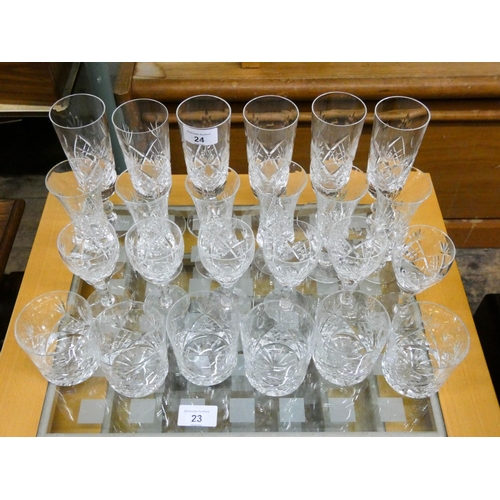 24 - A set of 24 matching cut wine glasses and tumblers