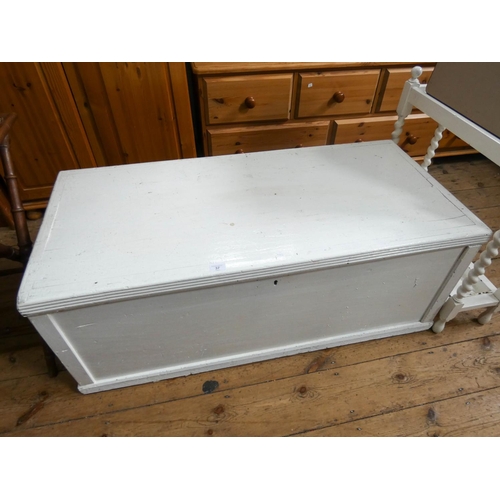 37 - A large white painted teak blanket chest, 4' wide