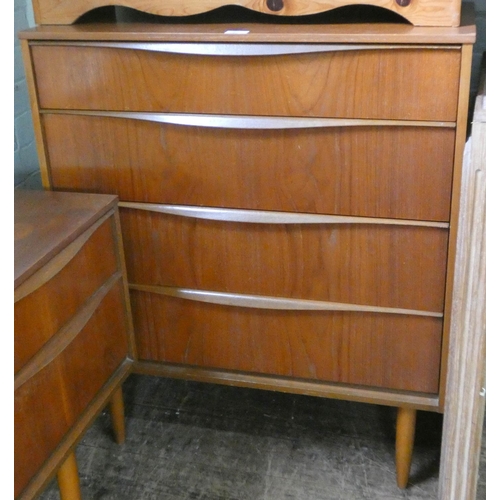 87 - A 1970's Austinsuite chest of four long drawers, 2'6 wide