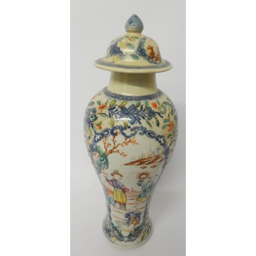 513 - A Chinese Famille Rose vase and cover, 31cms tall, with label to the base