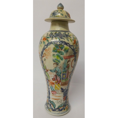 513 - A Chinese Famille Rose vase and cover, 31cms tall, with label to the base