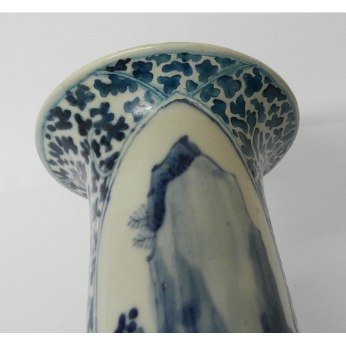 519 - A 19th century Chinese blue and white vase with four character mark to the base, standing 27cms tall... 