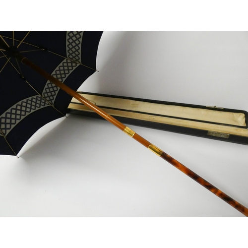 527 - A Brigg & Sons ladies umbrella / parasol with faux tortoiseshell handle and gilt metal mounts in fit... 