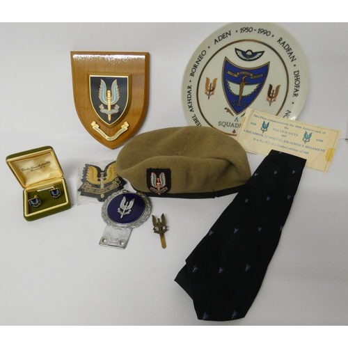 529 - Of SAS interest, a collection to include car badge, heraldic shield, badges, beret, tie and commemor... 