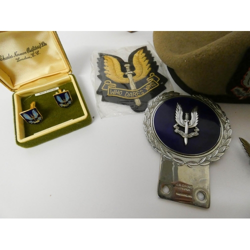 529 - Of SAS interest, a collection to include car badge, heraldic shield, badges, beret, tie and commemor... 