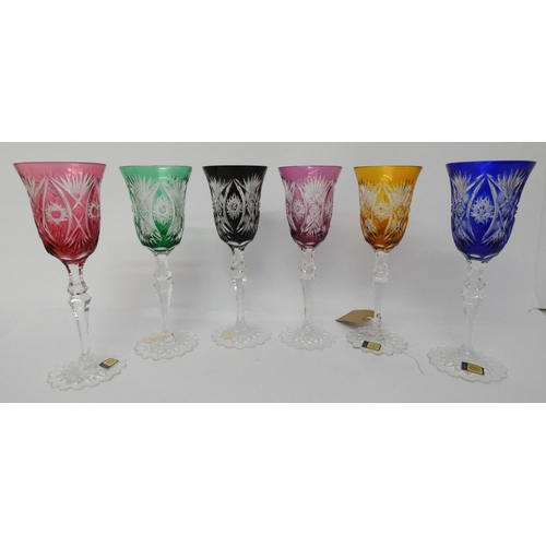 530 - A set of six bohemian cut glass wine glasses on shaped bases